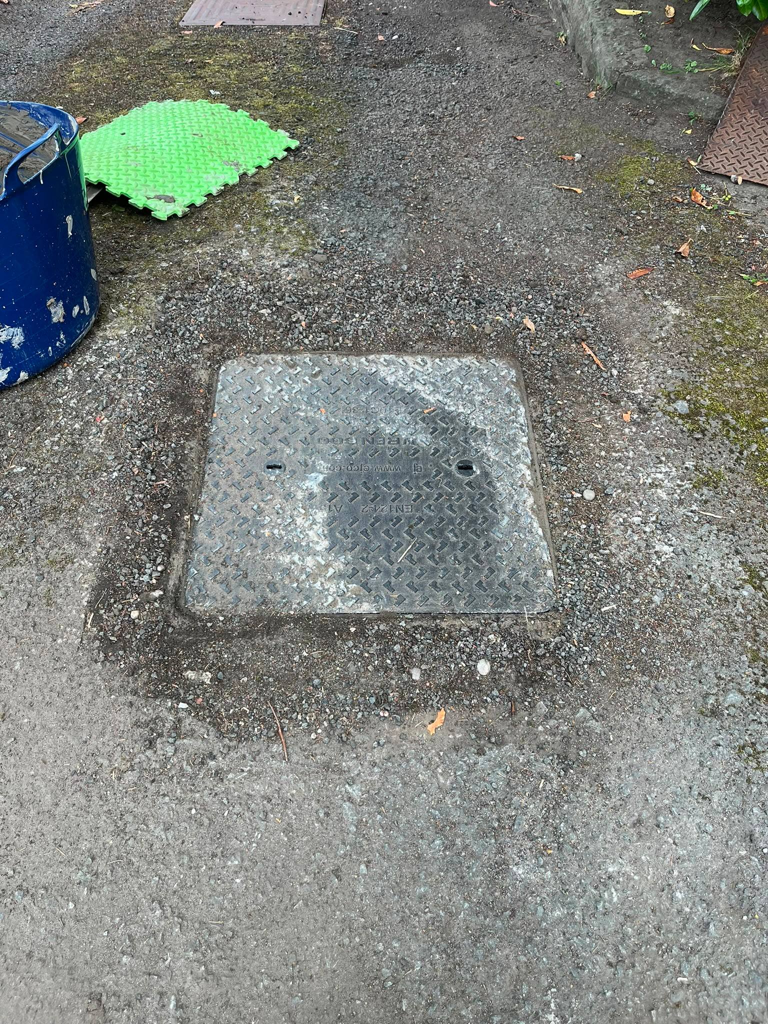 Newly installed manhole cover following professional manhole rebuilding and repairs by CB Drainage