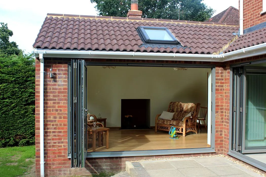 Open bifold doors on a modern house extension in Ipswich.