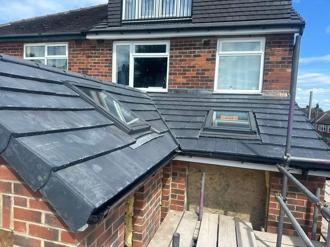 Professional tile roof installation with roof windows on a house in Otley, Leeds.