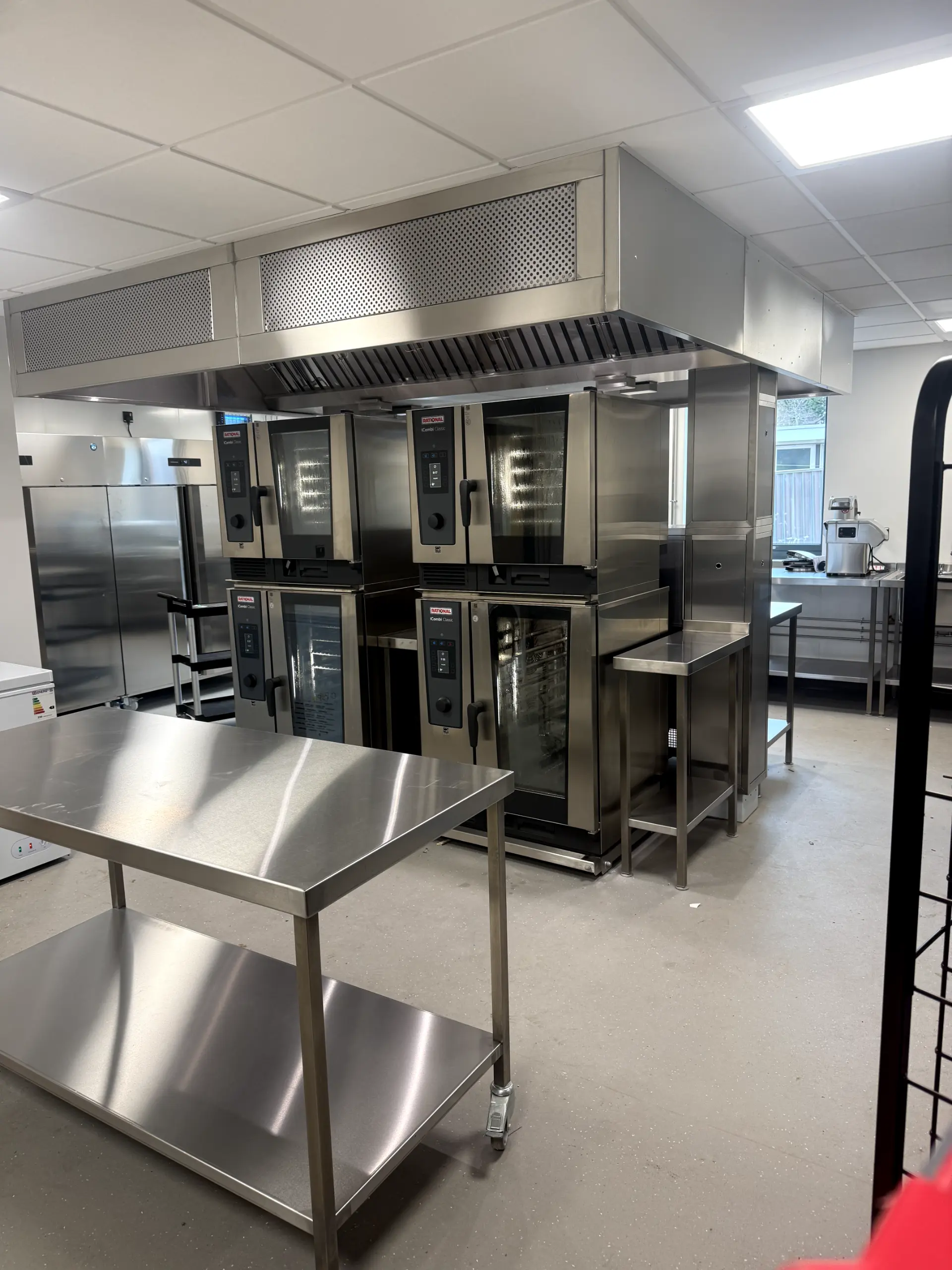 Modern commercial kitchen with stainless steel equipment and professional catering ovens in Darwen.
